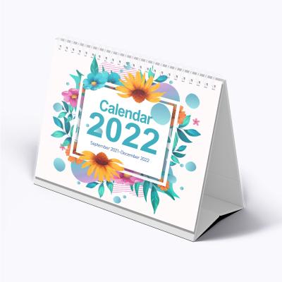 China Custom Logo Printed Table Calendar 2022 Stand Desk Calendars Spiral To Bind Stand Flip Table Desktop Flower Daily Monthly Calendar for sale