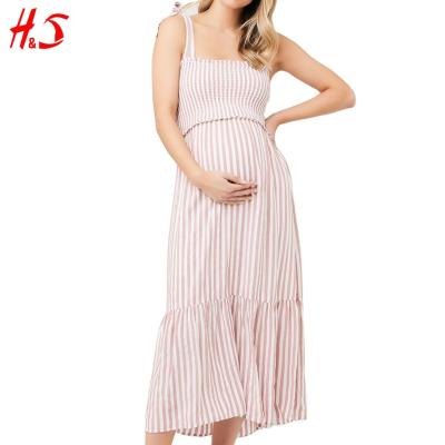 China Hotsell 2022 Wholesale Maternity Dress Pregnancy Dress Sleeveless Summer Breathable Smocked Midi For Women Pink Maternity Dress for sale