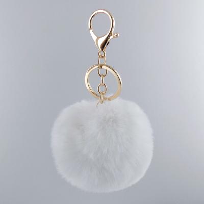 China Wholesale Soft White Faux Rabbit Fur Balls Faux Fur Pom Pom Upholstery Key Chain for sale