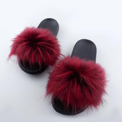 China 2022 Cheap Anti-slippery New Arrival Rainbow Raccoon Slippers Women Anti-slippery Artificial Fur Slippers Prices for sale