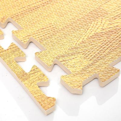 China Manufacturers Profesional Eva Puzzle Mat Wooden Grain Tatami Eco-friendly EVA Folding Foam Baby Play Mat for sale