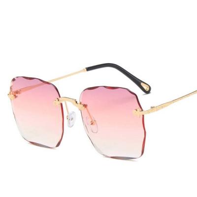 China Fashion sunglasses ladies Frameless glasses ladies sunglasses large gradient street shooting trend front line for sale