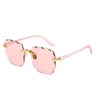 China Fashion Sunglasses Ladies Shape Rimless Cut Ins Gradient Sunglasses Retro Fashion Trend Sunglasses for sale