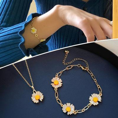 China Simple Fashion TRENDY Little Daisy Shape Women Jewelry Sets Daisy Necklace Bracelet Ring Sets Gold Plated for sale