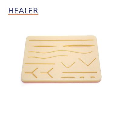 China Soft and Durable Silicone Suture Surgical Pad with Wounds for Medical Training for sale