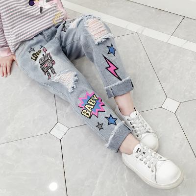 China Viable Hot Sale Girls Spring Fashionable Cartoon Printed Kids Loose Elastic Waist Jeans Pants for sale