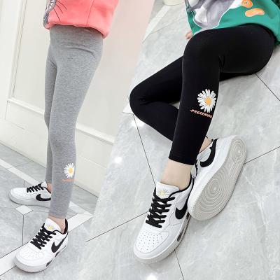 China Fashion QUICK DRY Wholesale Girls Pants Children's Gaiters Little Daisy Flower Elastic Girls Gaiters Slim Pants for sale