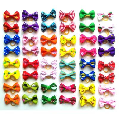 China Beautiful Viable Hot Selling Multi Color And Elastic Design Dog Hair Bow for sale