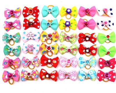 China Hot Selling Colorful Stocked Dogs Hair Accessories Dogs Rubber Bow for sale