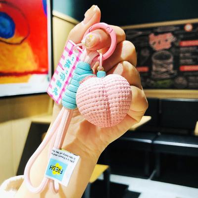 China Small Fashion Ornament Resin Cartoon Raspberry Discontent Car Peanut Creative Cute Pendant Rubber Key Chain Good for sale