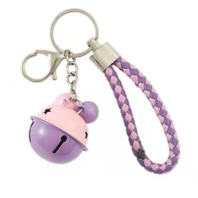 China Bell Cartoon Children's Day Gift Color Double Key Chain Cell Phone Bag Pendant Metal Key Pendant Braided Rope for sale