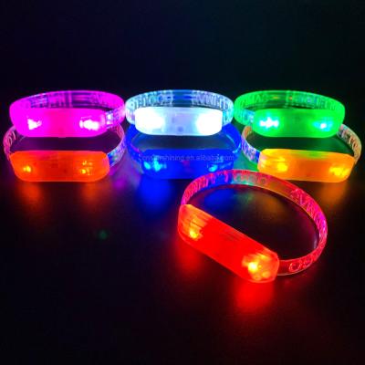 China Colorful Glowing Music / Motion Promotion OEM LED Wristband Customized Laser Engraved LOGO TPU LED Wristband for sale