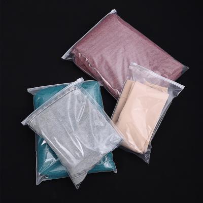 China Custom Clear Poly Matte Frosted Biodegradable Zipper Plastic Garment Bag Tank Top T-shirt Zipper Packaging Bags for sale