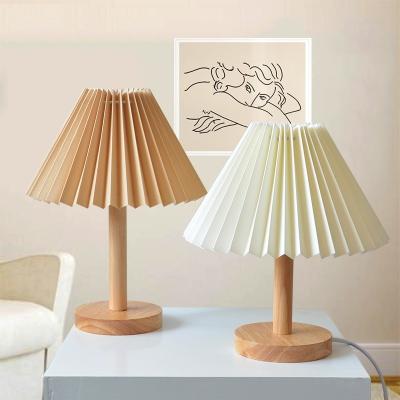 China Modern Fabric Lampshade Bedside Lamp With Left USB Rechargeable Modern Hotel Bedroom Nordic Minimalist Canvas Solid Wood Table Lamp for sale