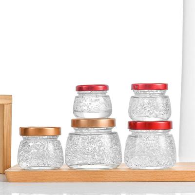 China Eco-freindly Bird Nest Glass Bottle 50ml 75ml 120ml 150ml Caviar Sauce 75g 75ml Recycled Bird Nest Glass Bottle Cylinder Glass Jar for sale