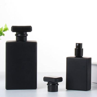 China Cosmetic Empty square rectangle matte black clear frosted 1 oz 30 ml 50ml 100ml spray glass perfume bottle with boxs for sale