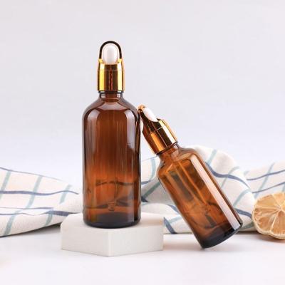 China Cosmetic 5ml 10ml 15ml 30Ml 50ml 100ml dropper glass bottle 30ml amber glass essential oil bottle with gold dropper for sale