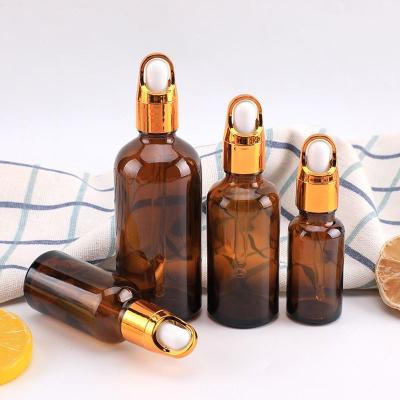 China Cosmetic New design Amber Serum Glass Dropper 15ml 30ml Essential Oil Bottle With Dropper Pipette for sale