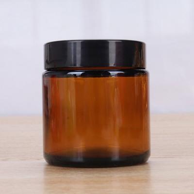 China Cosmetic 100g 120g 150g 200g 250g 300g 400g 500g Amber Clear Glass Jar With Plastic Screw Cap for sale