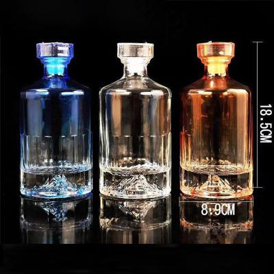 China Simple fashion vodka glass wine bottle 30ml 40ml 50ml 100ml Clear Mini Beverage Juice Coffee Wine Whisky Spirit Liquor Glass Bottle with Lids for sale