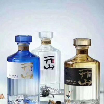 China Simple fashion Customized stock 700ML 500ML vodka unique glass bottle for sale