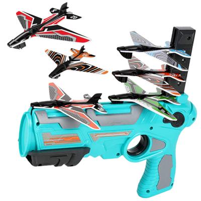 China Gun with Flat Boys Guns Toy Kids Shooting Air Airplane Launcher Bubble Catapult Plastic Flight Toys Gun with Airplane for sale