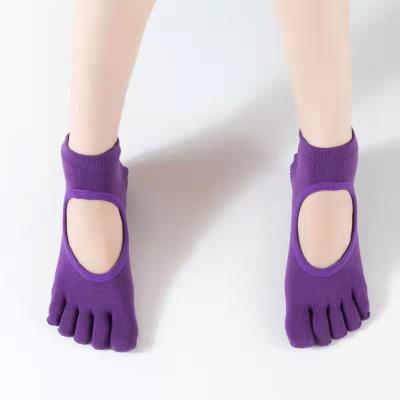 China Anti slip slit toe socks grip yoga solid colorful backless wholesale sports socks for sale