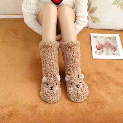 China Winter Sports Custom Fuzzy Fuzzy Fluffy Women's Anti Slip Slipper Socks Embroidery Logo Slipper Socks for sale