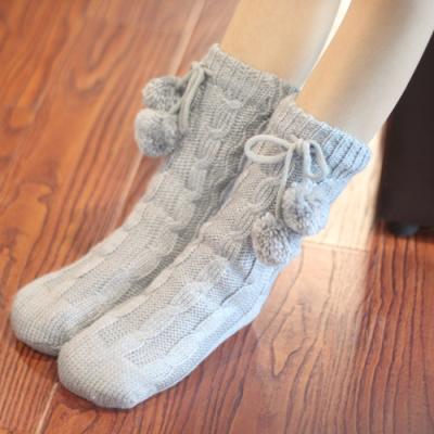 China High Quality Antibacterial Knitted Winter Socks Anti Slip Pompom Comfortable Fuzzy Floor Slipper Knitted Warm Woman for sale