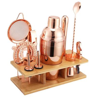 China Amazon Premium Metal 11 Piece Stainless Steel Bar Tools Copper Bartender Kit with Stylish Bamboo Stand Rose Gold Cocktail Shaker Set for sale