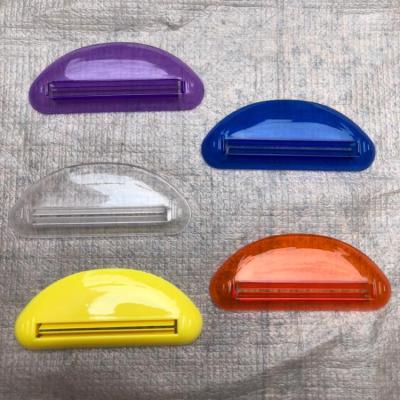 China Sustainable Plastic Custom Pushing Tube Toothpaste Backup Squeezer With Customized Logo for sale