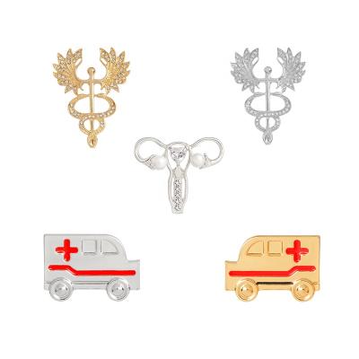 China Europe Registered Nurse Brooch Medical Symbol Caduceus Corsage for Doctors Nurse Medical Student Graduation Gift Jewelry Enamel Pins for sale