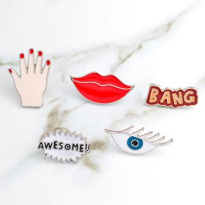 China Custom Europe Medical Eye Red Lips Strike Awesome Hand Lapel Badge Brooch Jewelry Enamel Pins for sale