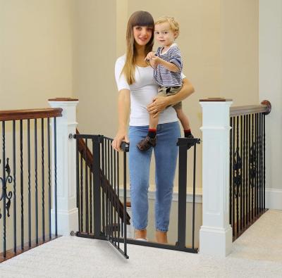 China Temporary Baby Products Safety Guardrail Gate Adjustable Household Safety Baby Metal Pet Gate for sale