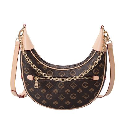 China New niche PU design half-month single-shoulder armpit bag fashion portable single bag female saddle bag for sale