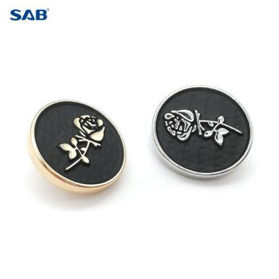 China High quality nickel free metal logo alloy zinc button buckle customized leg button for clothes à venda