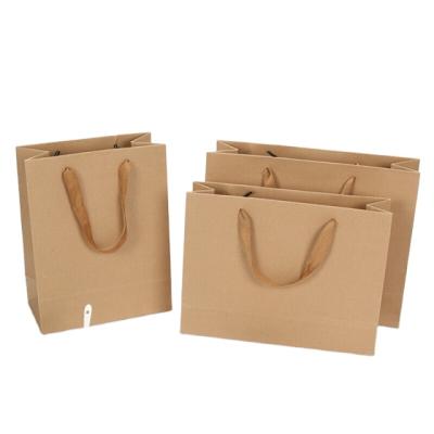 China Red Wine Retrievable Paper Bag Clothing Handbag Brown Tea Food Honey Gift Pepper Sauce Wine Bag for sale