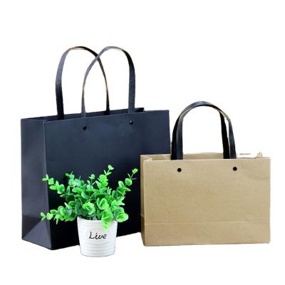 China Waterproofness Wholesale-manufacturers supply high quality kraft paper handle gift shopping bags for sale