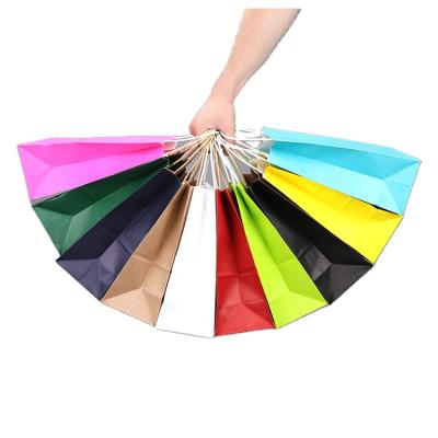 China Waterproofness accept customer logo-simple colorful kraft paper shopping bag for sale