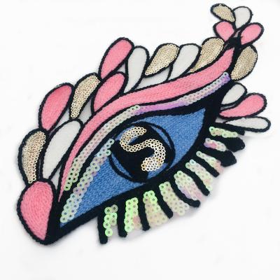 China Handmade Wholesale High Quality Pink Eye Sequin Patch Eye Patch Garment Accessories Clothes Patch Applique for sale