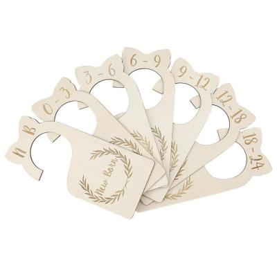 China Europe Hot Sale Customize Natural Engrave Set of 7 Wooden Baby Closet Dividers Hanging Closet Organizer Baby Gift Set with Package for sale