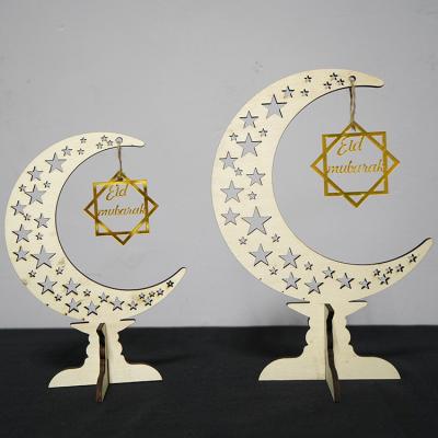 China New Style Wooden Ramadan Ornaments Eid Moon Hollowed Led Lamp Decorations Eid Mubarak Home Decor for sale