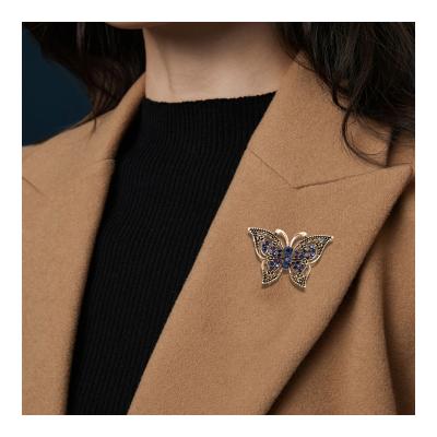 China Hot Selling HANDMADE CRYSTAL CROSS BUTTERFLY Elegant LARGE PIN VINTAGE CUSTOM GOLD PLATED BROOCH FOR WOMEN FOR MEETING for sale