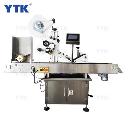 China Food labeling machine automatic sticker labeling machine for round bottles, cans, tubes for sale