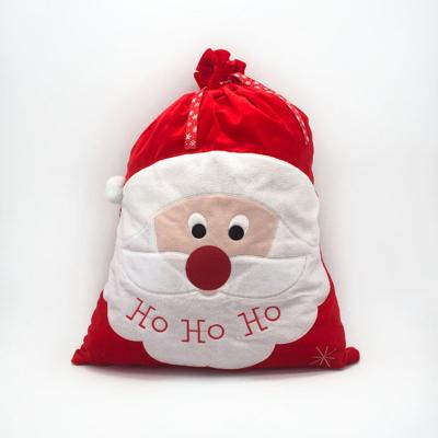 China Wholesale Hot Selling Embroidered Pleuche Santa Claus Drawstring Christmas Gift Bags For Christmas Decorations for sale