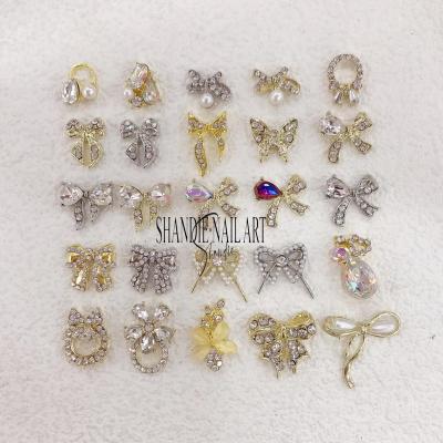 China Easy Apply Alloy 3d Nail Charms Silver Gold Bow Heart Nail Art Jewelry 3d Nail Art Decoration for sale