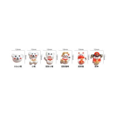 China Easy Apply New Year Resin 3d Accessories Nail Cute Big Cartoon Lucky Cute Bear Red Cat Nail Decoration Net New Year for sale