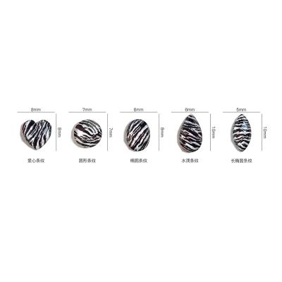 China Easy Apply DIY Resin Zebra Nail Accessories Sale Black And White Cow Nail Art Decoration To Beautiful Love 3d Oval Hot Water Drop for sale