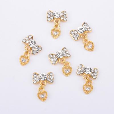 China Easy Apply Wholesale Nail Art Decoration Mix Designs Bowknot 3D Nail Art Sticker With Shiny Rhinestones for sale