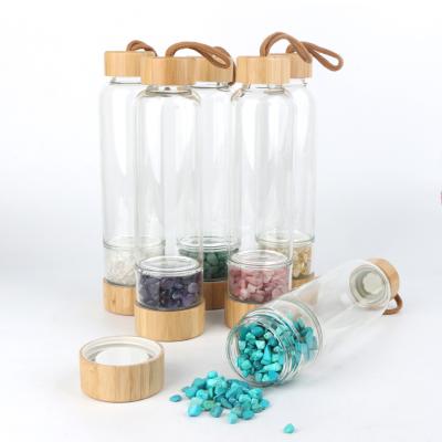 China China Glass Water Bottle With Bamboo Lid Chips Gravel Water Bottle Natural Crystal Crystal Wholesale for sale